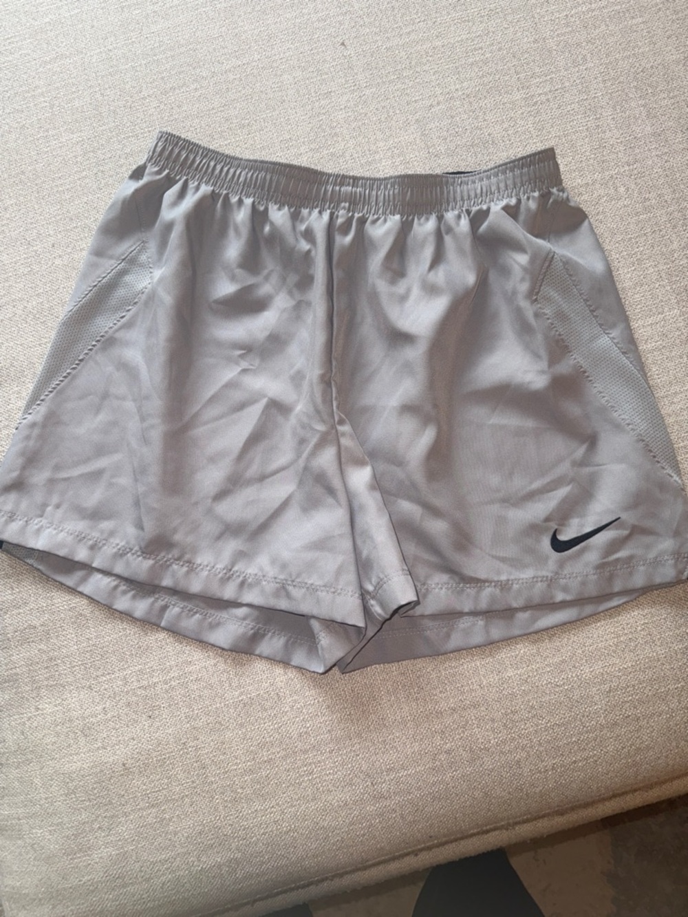 Nike Light Gray Running Shorts with Black Swoosh